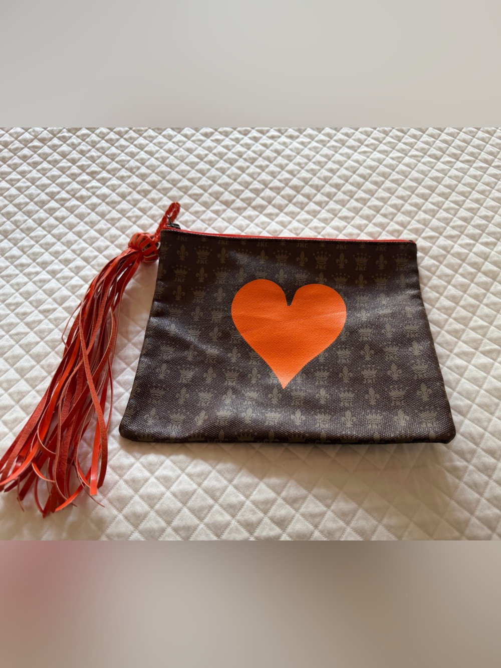 Heart Print Brown Wristlet Clutch with Orange Tassel